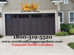 Garage door repair installed in Concord North Carolina. Double door, Double steel with windows
